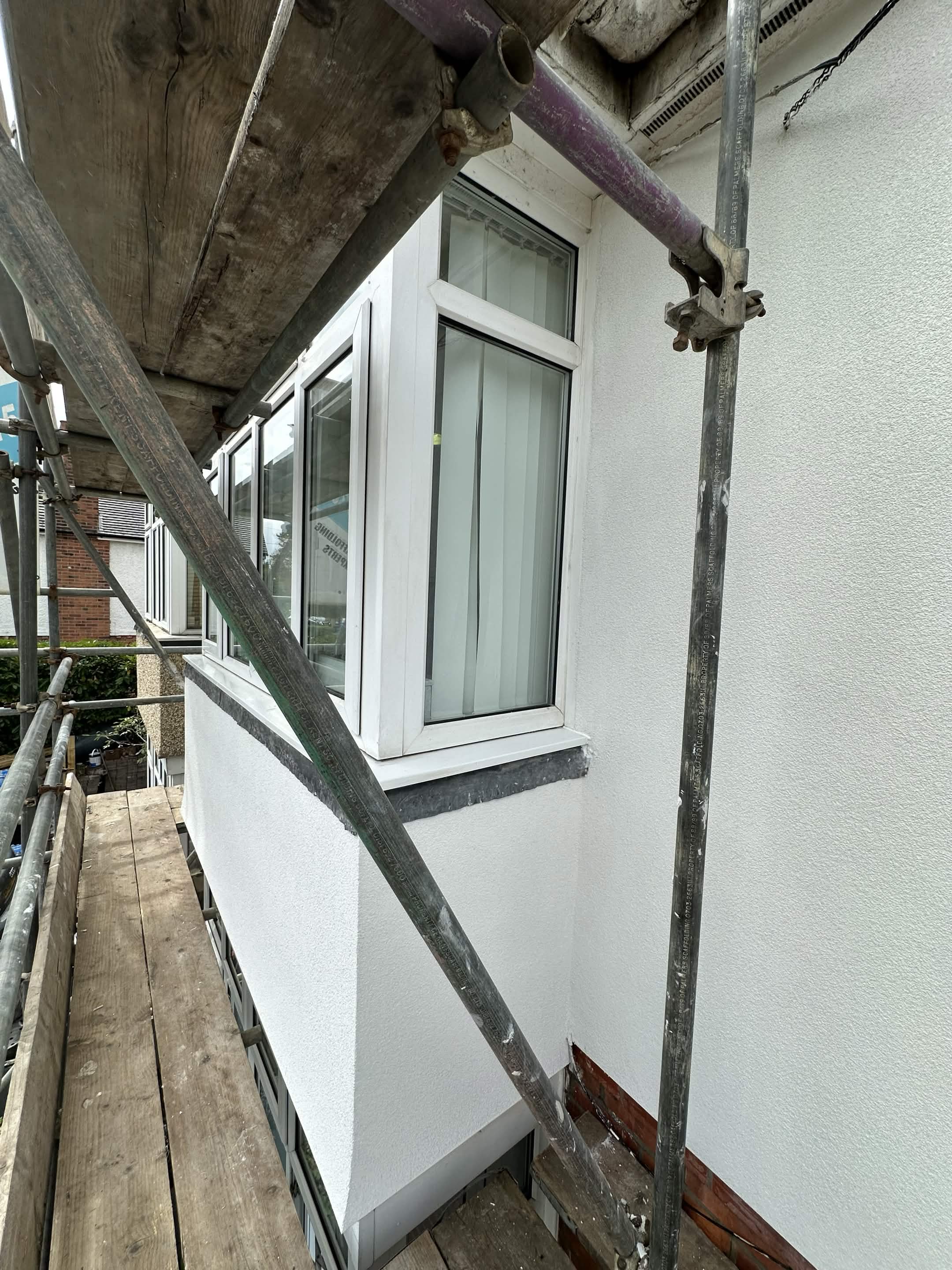 Left property front finished baywindow mid view