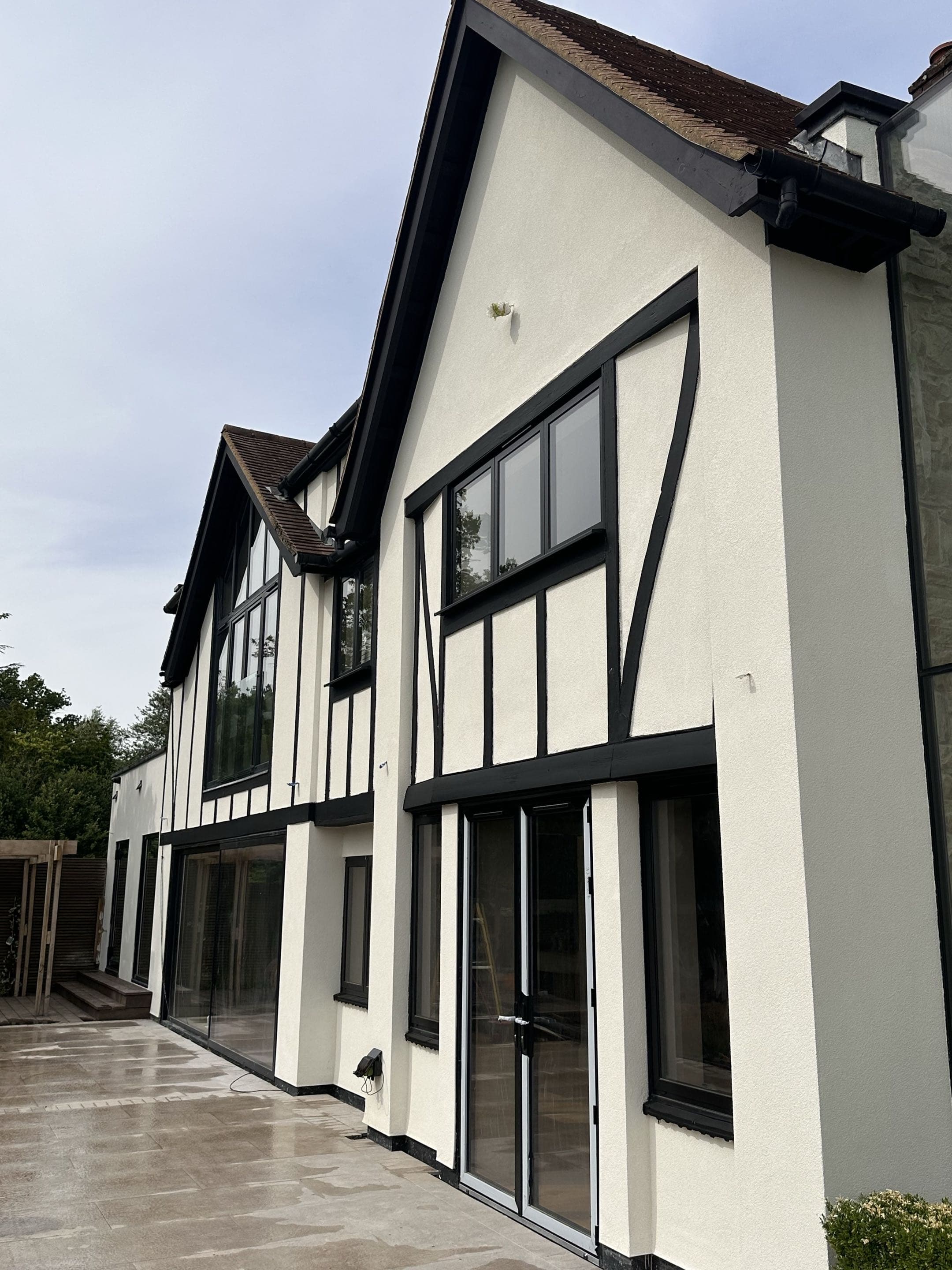 Silicone render finish with Tudor-style beam detailing, Reading